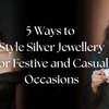 Elegant woman styling layered silver jewellery for festive and casual looks.