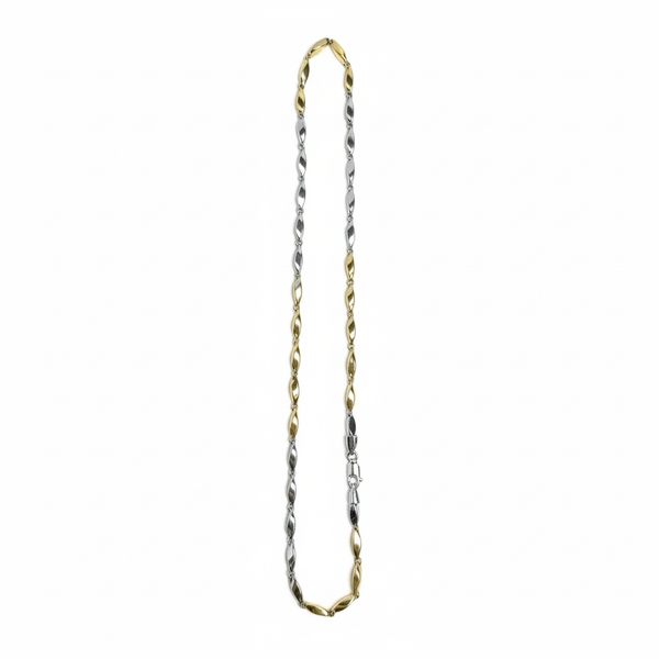 Gold and silver chain necklace on a white background