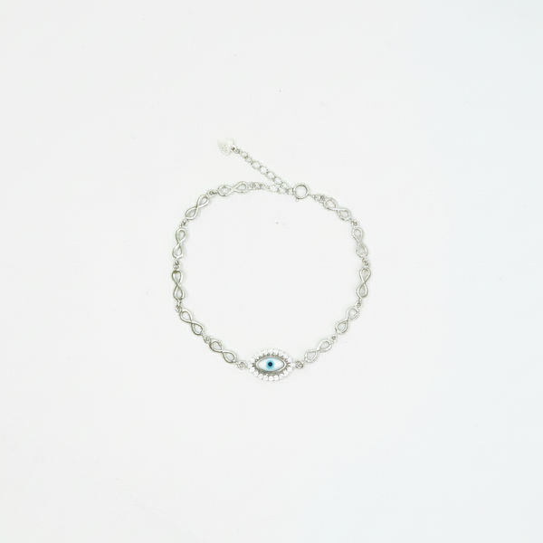 Silver infinity Evil Eye bracelet with a blue Nazar centerpiece displayed on a white background.