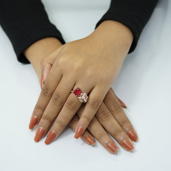 Stylish open ring with ruby crystal and floral diamond accent