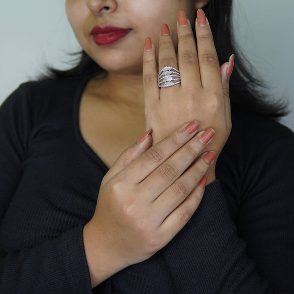 Stylish silver statement ring with multi-band crystal detailing