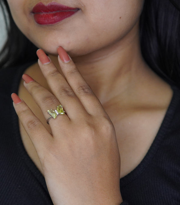 Silver-plated adjustable butterfly ring featuring marquise-cut green crystals, stylish handcrafted jewelry for women perfect for parties and gifting