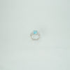 Luxury silver statement ring with aqua blue gemstone centerpiece