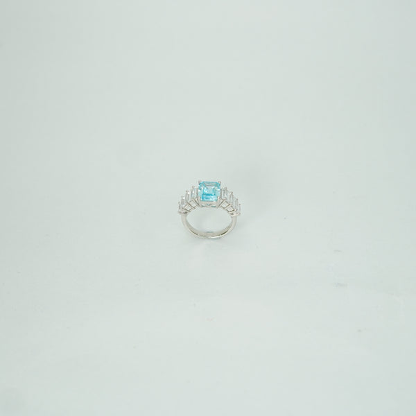 Luxury silver statement ring with aqua blue gemstone centerpiece