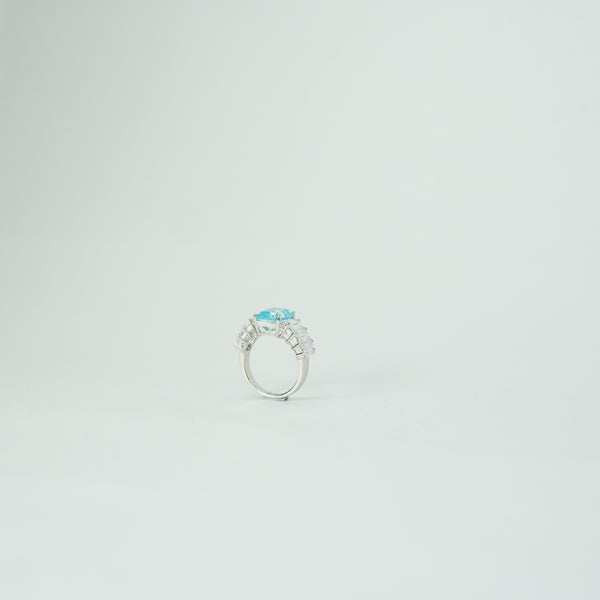 Elegant aqua blue emerald cut crystal ring for women in silver finish