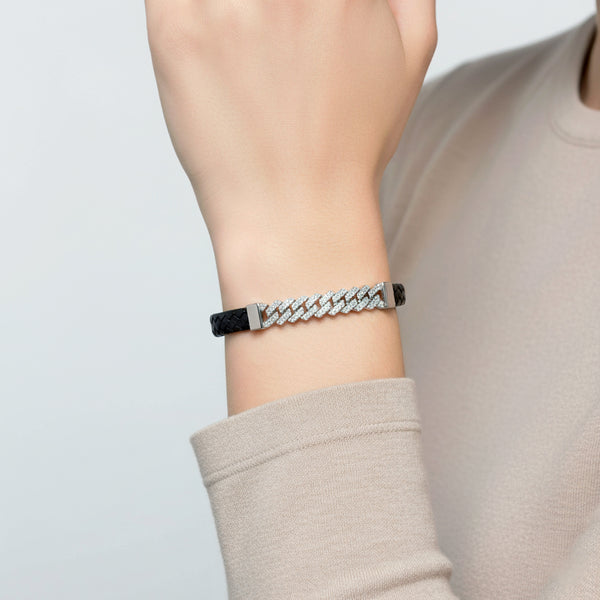 Bracelet on a wrist with a neutral background