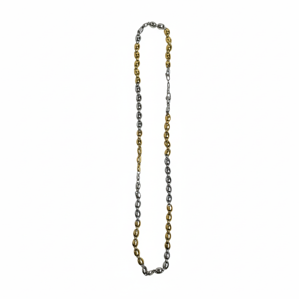Two-tone necklace chain with gold and silver links on a white background