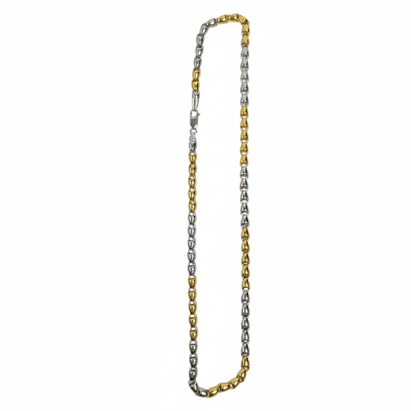 Two-tone gold and silver chain necklace on a white background