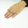 Elegant silver leaf pattern statement ring for women with crystal accents on white background