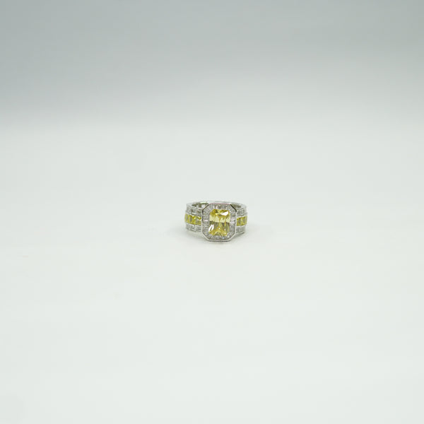 Stylish silver-plated ring featuring golden yellow gemstone centerpiece