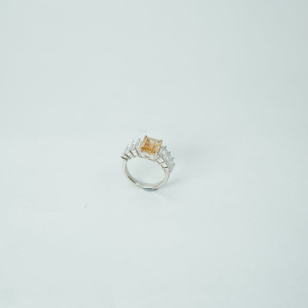 Elegant yellow emerald-cut gemstone ring with silver band for women