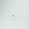 Elegant aqua blue emerald cut crystal ring for women in silver finish