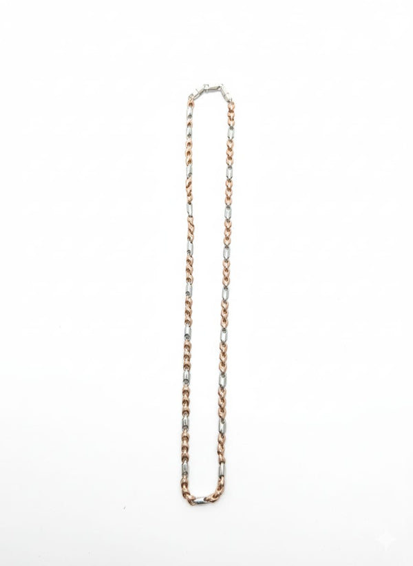 two tone silver and Gold chain necklace on a white background
